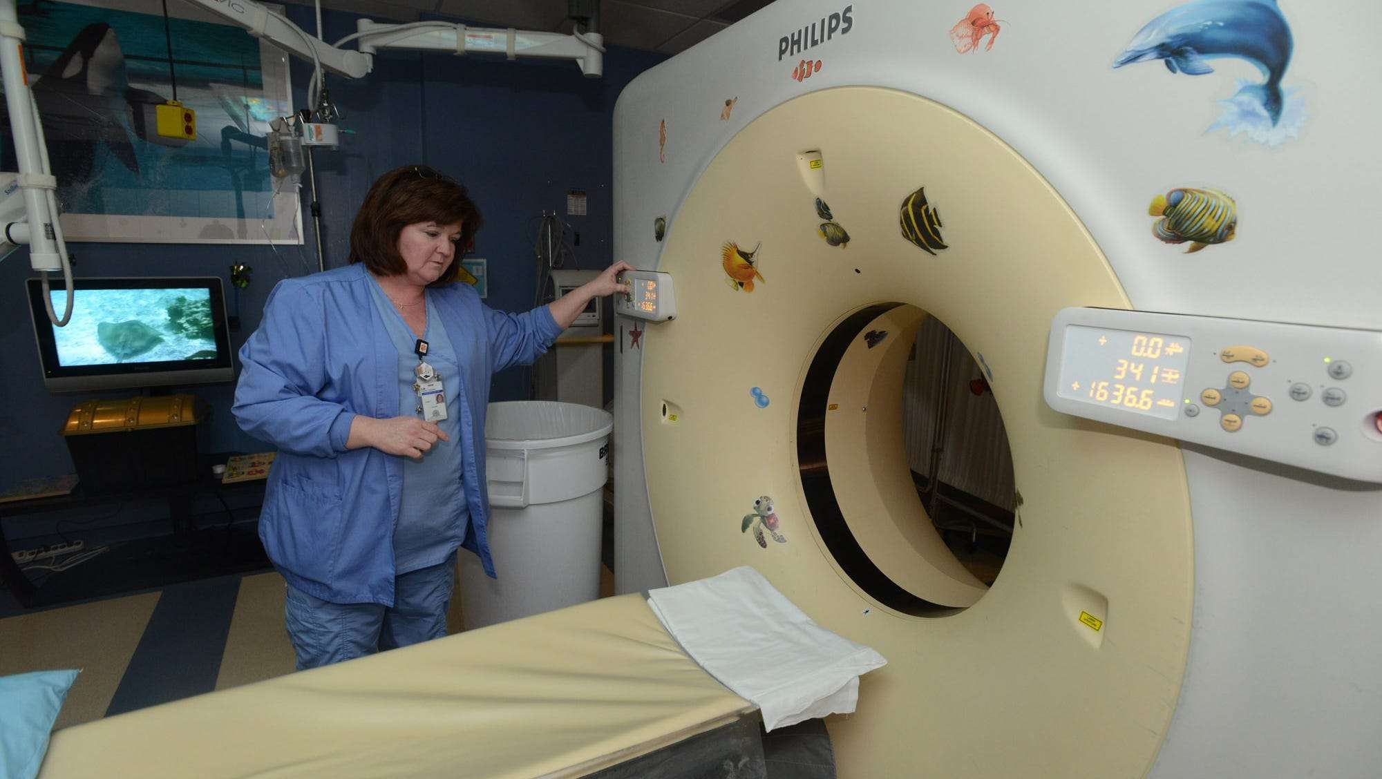 Experts weigh risks of CT scans